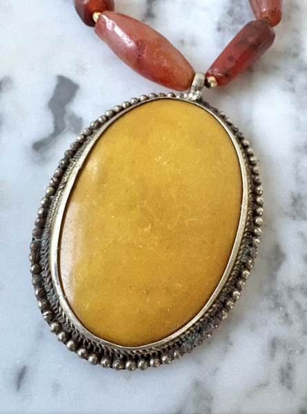 20" Vintage Carved Carnelian Beaded Necklace with Brass and Resin Pendant